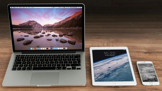 Digital Dropshipping Business Name Ideas - a macbook next to an ipad and an iphone