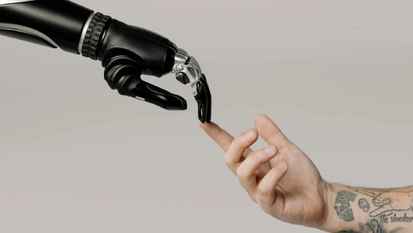 Dropshipping Tech Business Name Ideas - a human hand and a robotic hand